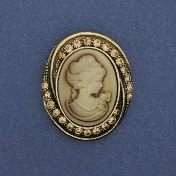 Broszka-kamea „Dama” z kryształami w złocistym metalu 44×37 mm +