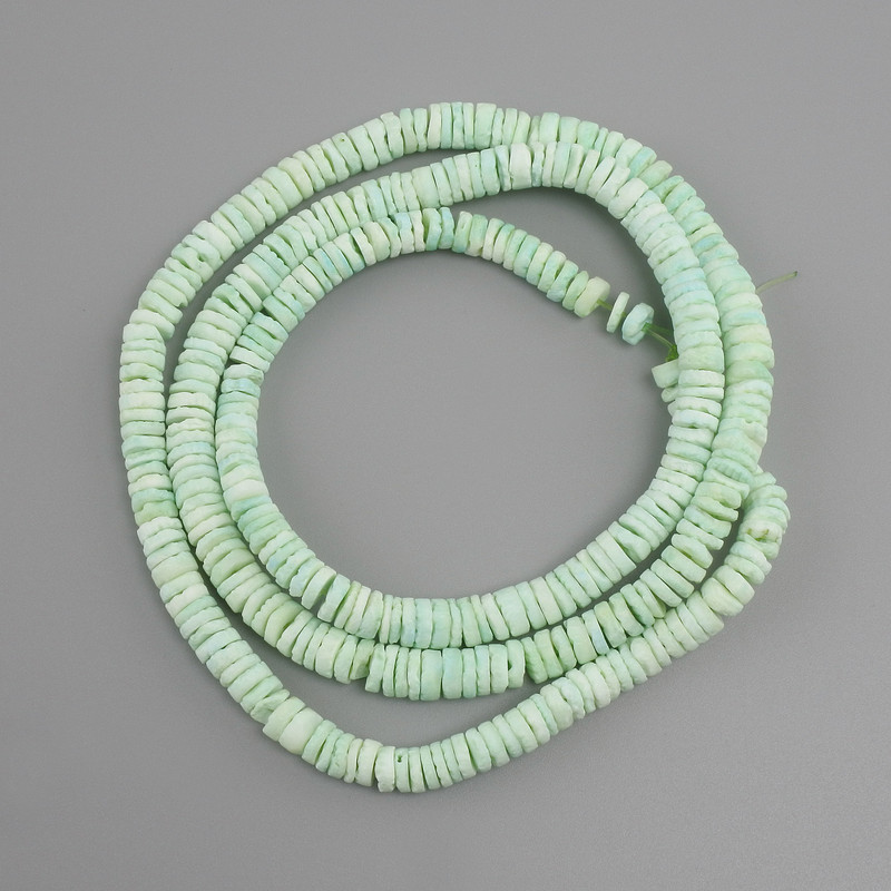 Koraliki nieobrobione z muszli Skafarka, rondel, średnica około 6 x 1,5-3 mm, długość około 61 cm, na żyłce jubilerskiej