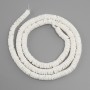 Koraliki nieobrobione z muszli Skafarka w kształcie rondeli, średnica 7×1,5–2 mm, długość 61 cm ± na żyłce
