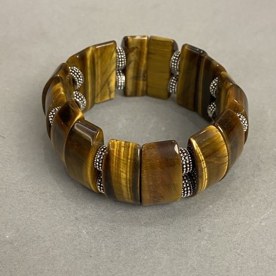 Bransoletka z tygrysiego oka — ogniwo 25×10 mm ±, z metalowymi wstawkami, długość 18 cm ±, elastyczna