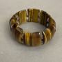 Bransoletka z tygrysiego oka — ogniwo 25×10 mm ±, z metalowymi wstawkami, długość 18 cm ±, elastyczna