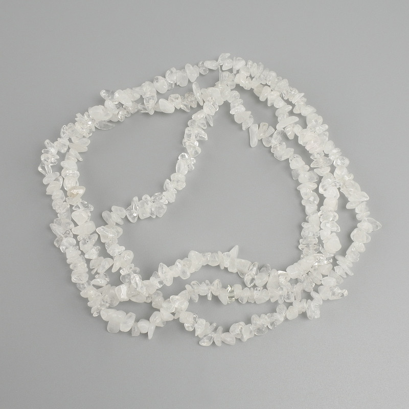 Koraliki kryształ górski w drobinkach, średnica 5-9×2-3 mm, 5 mm±, długość 78 cm± na żyłce