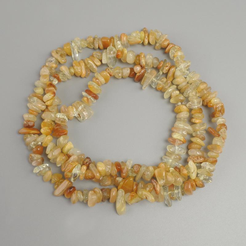 Koraliki agat – drobinki, średnica 6–12×2–6 mm, długość 76 cm ± na nitce