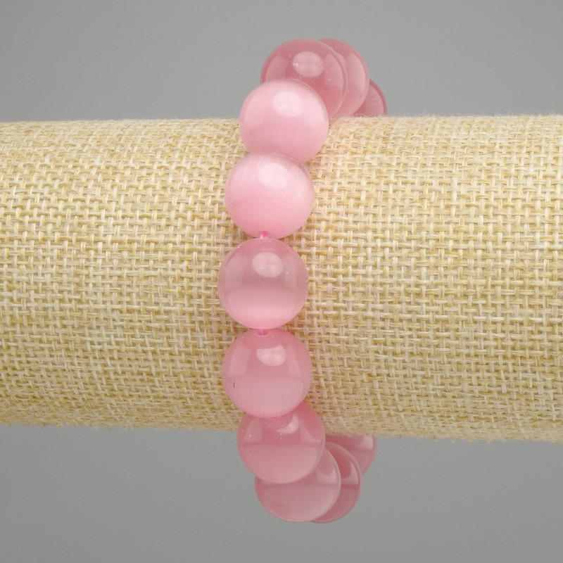 Bransoletka kocie oko rózowa kulki gładkie, średnica 13,5 mm, długość 18 cm, elastyczna