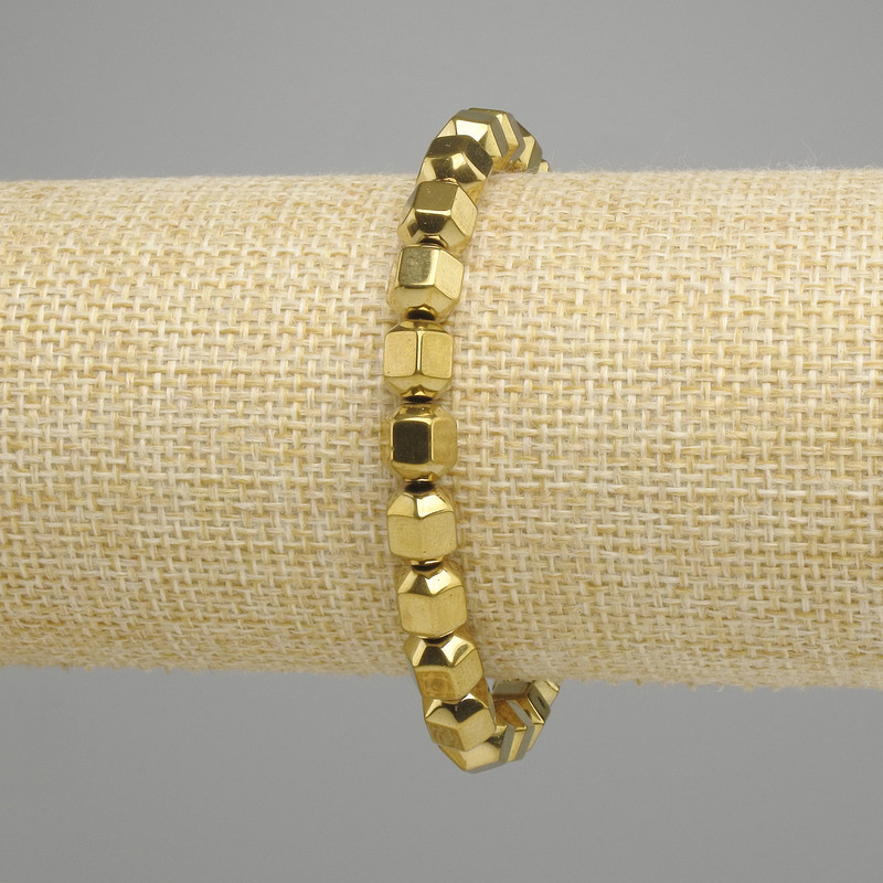Bransoletka hematyt wielościan 8x7 mm +- kolor złocisty, długość 18 cm +- elastynowa