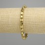 Bransoletka hematyt wielościan 6x5, 5mm+- kolor złocisty, długość 18cm+- elasticzna
