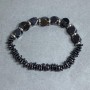 Bransoletka Hematyt sieczka 8x2mm+- wielościan 8mm+-, długość 18cm +- stretch