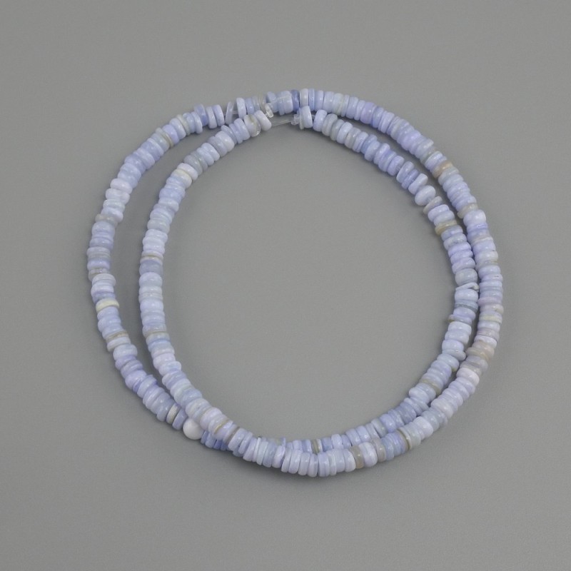 Koraliki z muszli skafarka rondel, średnica 4x1, 5-2 mm+-, długość 38 cm+- na żyłce