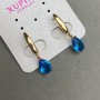Kolczyki Xuping z niebieskimi kamieniami 28x7 mm pozłocenie 18K