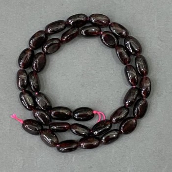 Granatowe koraliki z otoczakem 12×8 mm, długość 40 cm+