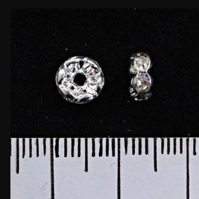 Łącznik rozdzielacz rąbek (rondelek) z białymi cyrkoniami, kolor metalu srebro, 5 mm, 100 szt. / opak.