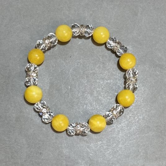 Bransoletka cytryn (akryl) gładka kulka 10 mm +- czeski kryształ fasetowany rondel 8x6 mm+-, długość 18 cm +- stretch