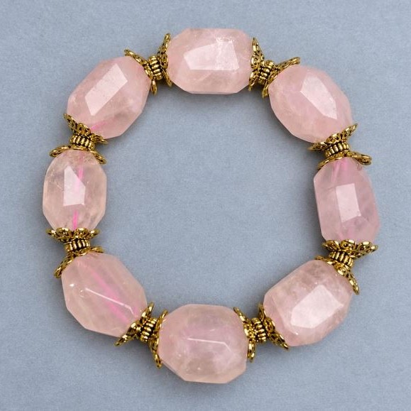 Bransoletka Różowy kwarc, otoczak, średnica 20x15 mm +/-, długość 18 cm +/- na sznurze (strecz)