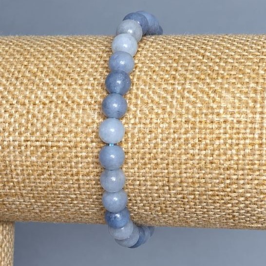 Bransoletka akwamaryn gładka kulka, średnica 6,5 mm ±, długość 18 cm ± na gumce (strecz)