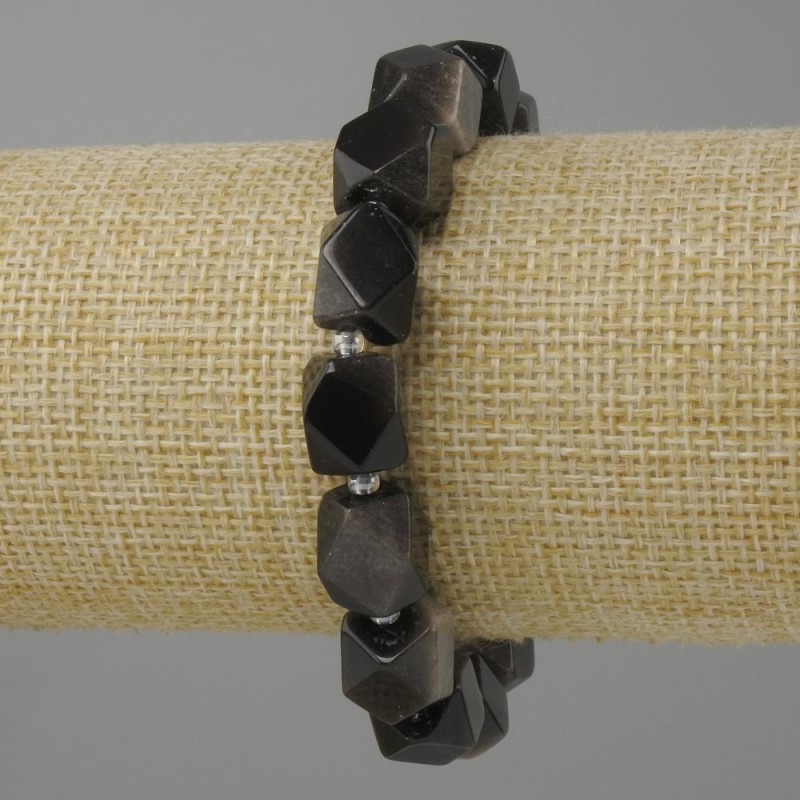 Bransoletka srebrzysty obsydian wielościany, średnica 12x10 mm +- koralik 3 mm+-, długość 18 cm +- na gumce
