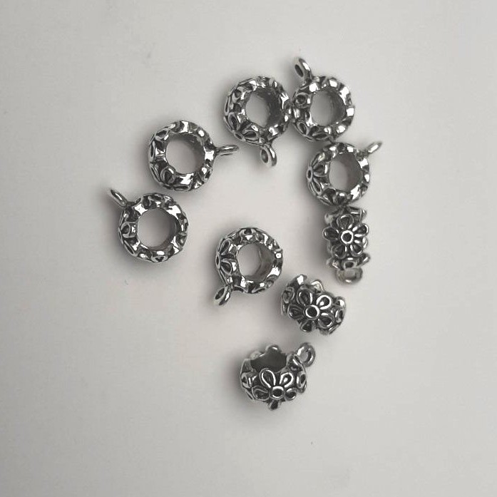 Okucie bajl utrzymujący kwiat, kolor metalu 'srebro', średnica wewnętrzna 6 mm, opakowanie 8 szt.