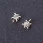 Furnitura jubilerska koralik-wstawka 'Muszelka' w kolorze metalu 'srebro' 7×8 mm opakowanie 20 g ± 40 sztuk