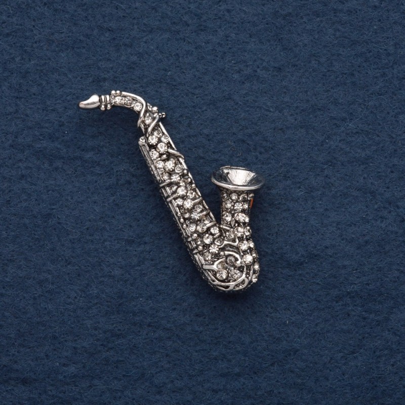 broszka „Saksofon” 5×2 cm, z szarego metalu