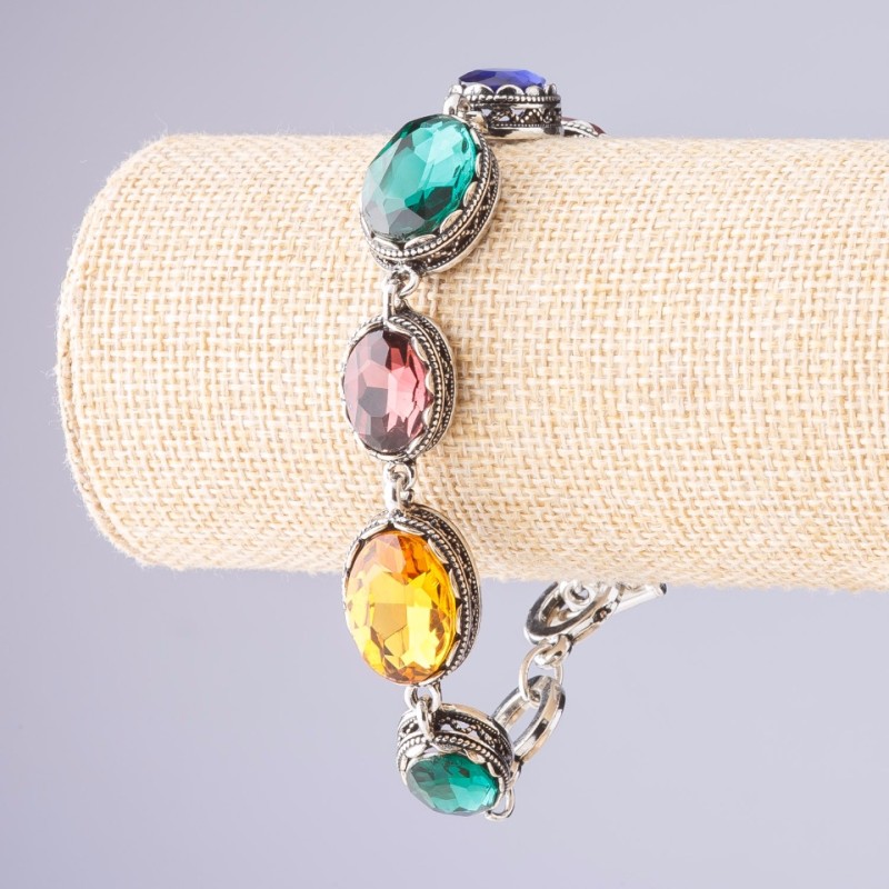 Bransoletka z różnokolorowymi kryształami, oprawa „zębik”, owalny kamień, 7 szt., 20 × 16 mm i 13 × 16 mm, długość 18–21 cm