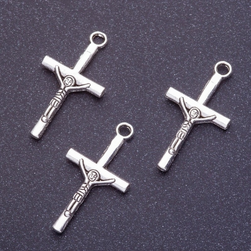 Okucia jubilerskie - wisiorek w kształcie rozpiętego krzyża, długość 28 mm, otwór 1,5 mm, kolor srebrny, masa 20 g, ±19 szt.