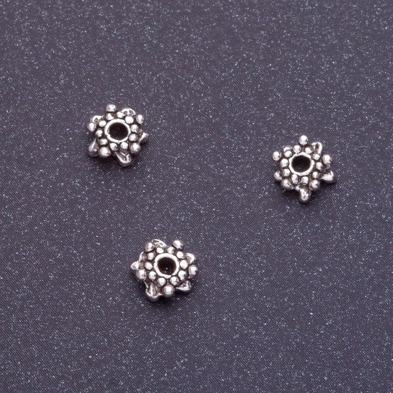 Okucia: wstawka między koralikami Śnieżynka, d1-6 mm, d2 mm, kolor srebro, fason 20 g +/- 51 szt.