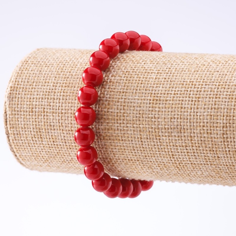 Bransoletka z koralu prasowanego na elastycznej gumce, średnica 8 mm, długość 18 cm