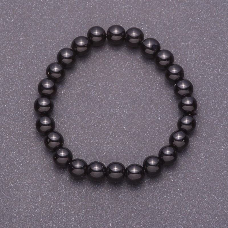 Bransoletka z naturalnego czarnego agatu (prasowany) – gładka kulka, średnica 8 mm, na elastycznej gumce, obwód 18 cm