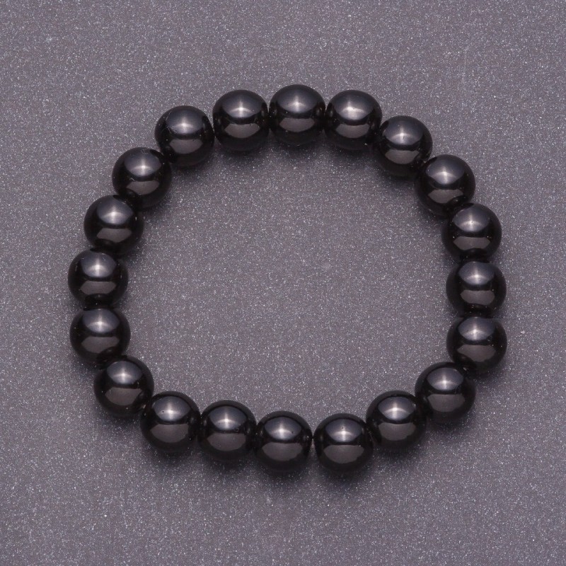 Bransoletka z naturalnego czarnego agatu (prasowany) — gładka kula, średnica 10 mm na gumce, obwód 18 cm