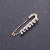 Broszka-spinka metalowa złocista 5,5×1,8 cm