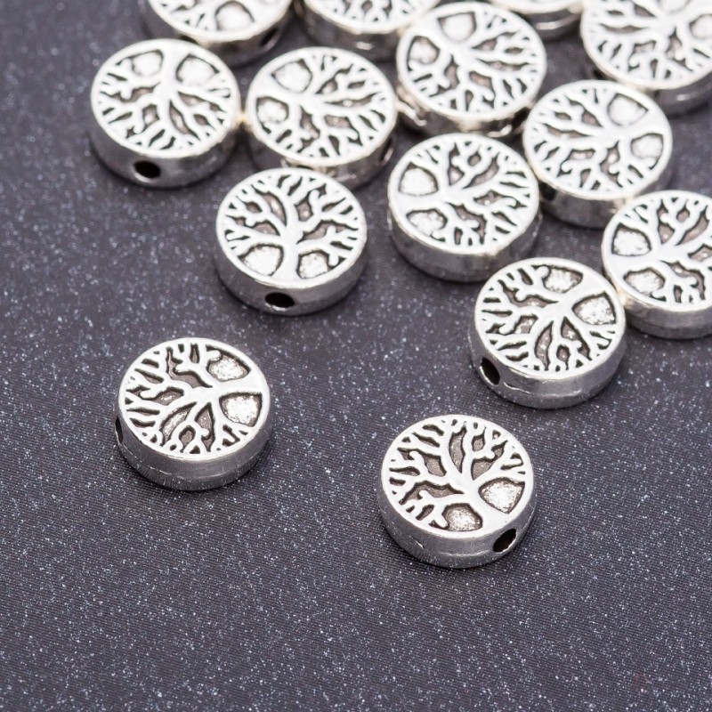 Koralik-wstawka z drewna, średnica 9×3 mm, opakowanie 20 g, ±17 szt.