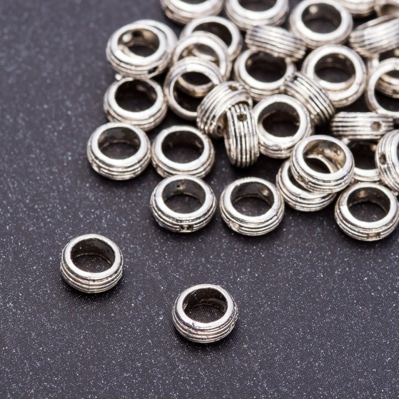 Koralik-wstawka Pandora, pierścień o średnicy 7×3 mm, otwór 5 mm, opakowanie 20 g, ±75 szt.