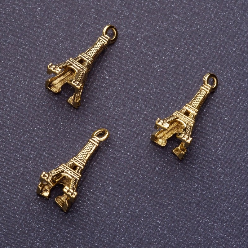 Zawieszka – Wieża Eiffla, L0 mm, d1-1,5 mm, d2-8 mm, kolor: stare złoto, fason 20 g, ± 23 szt.
