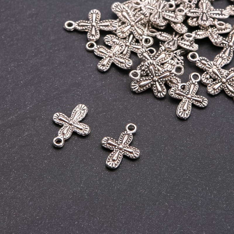 Zawieszka krzyż, wymiary 19×14 mm, masa około 20 g, opakowanie 25 szt.