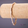 Bransoletka Xuping z białymi kamieniami, długość 18–20 cm, grubość 5 mm, kolor złoty