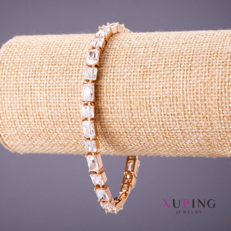 Bransoleta Xuping z białymi kamieniami, długość 18-20 cm, grubość 6 mm, kolor złoty