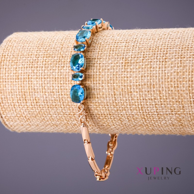 Bransoletka Xuping z błękitnymi kamieniami, długość 18–20 cm, grubość 4–7 mm, kolor złoty