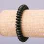 Bransoletka na gumce ze sztucznego szungitu w kształcie gładkich rondeli, średnica 10×4,5 mm, długość 18 cm +