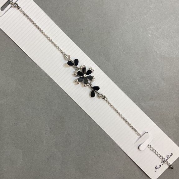 Bransoletka Czarny Kwiat z białymi kryształami, średnica 19 mm, długość 16–19 cm+