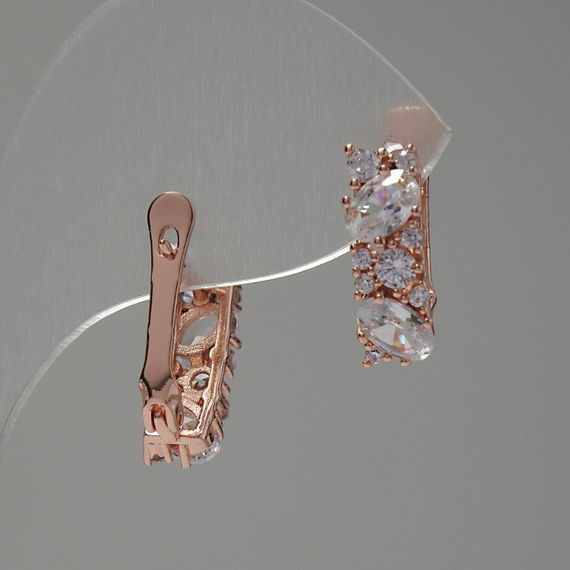 Kolczyki z białymi kryształami 17×6 mm w złotym metalze