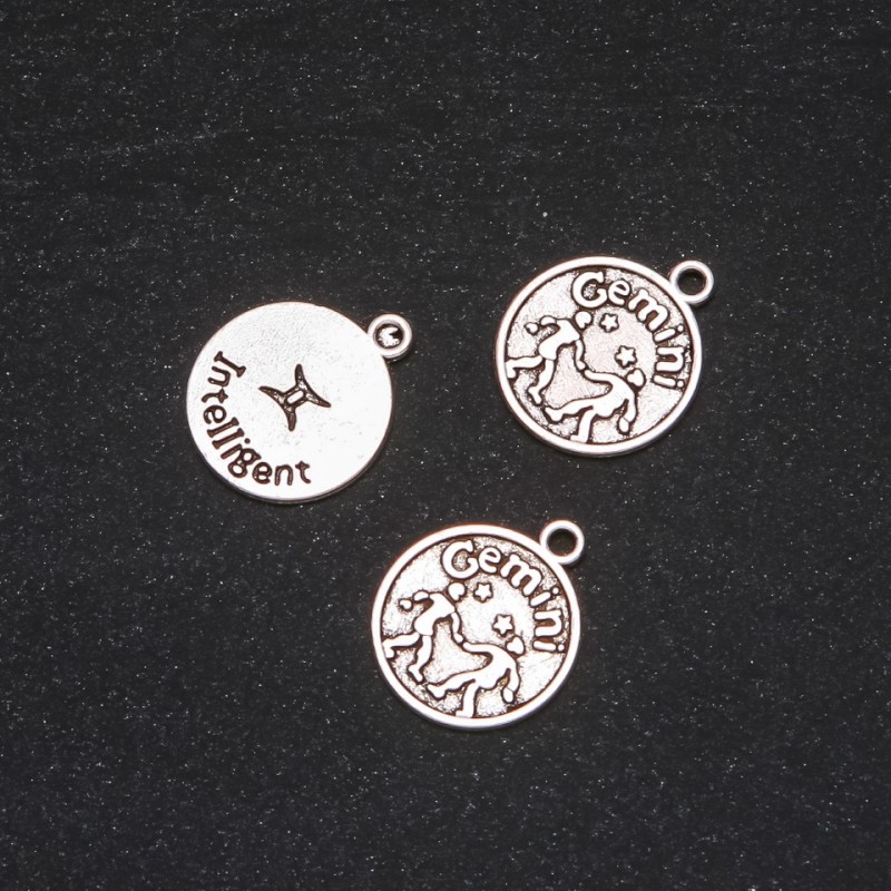 Okucia – zawieszka Zodiak Bliźnięta, średnica 17 mm, opakowanie 20 g ± 12 szt.