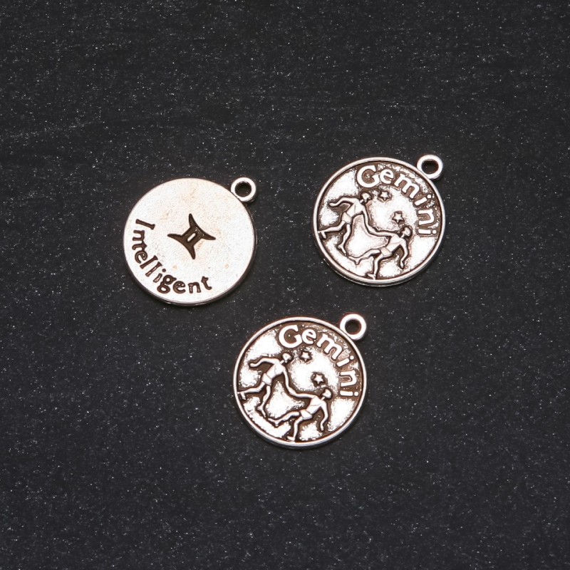 Zawieszka Zodiak Bliźnięta, średnica 17 mm, opakowanie 20 g +/- 10 szt.