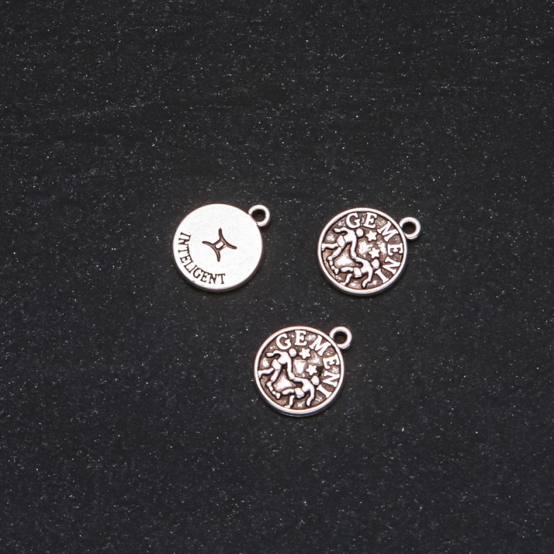 Zawieszka Zodiak Bliźnięta, średnica 12 mm, opakowanie 20 g +/- 17 szt.
