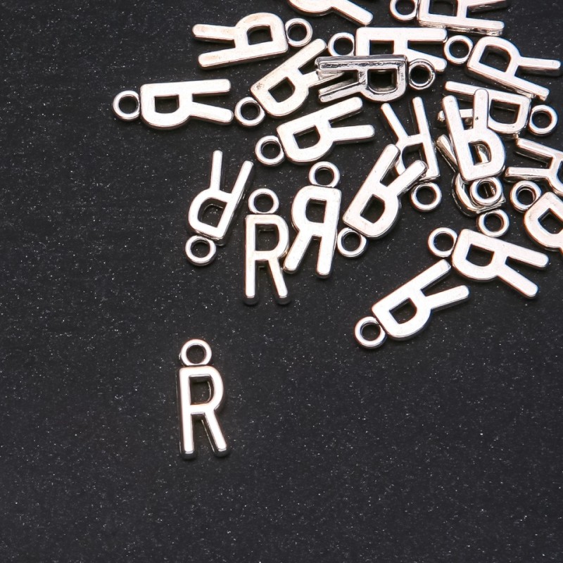 Zawieszka litera «R», 17×7 mm, opakowanie 20 g (+/- 25 szt.)