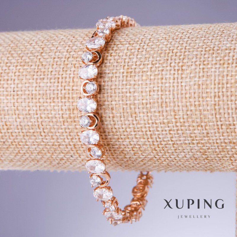 Bransoletka Xuping z białymi cyrkoniami, grubość 7 mm, długość 17–19,5 cm, pozłacanie 18K
