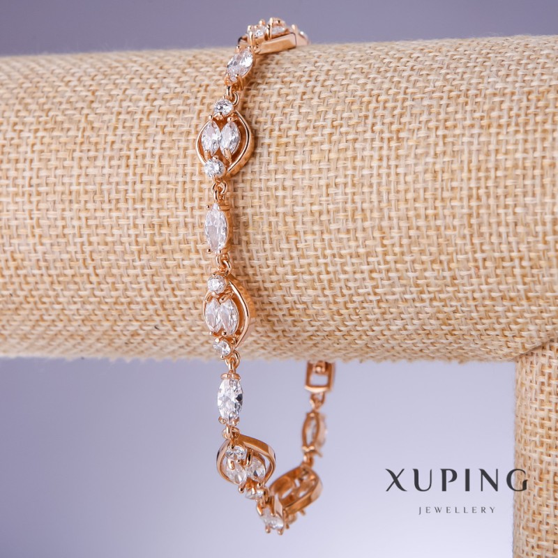 Bransoletka Xuping z białymi cyrkoniami, grubość 4–9 mm, długość 19–22 cm, pozłacanie 18K