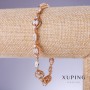 Bransoletka Xuping z białymi cyrkoniami, grubość 4–9 mm, długość 19–22 cm, pozłacanie 18K