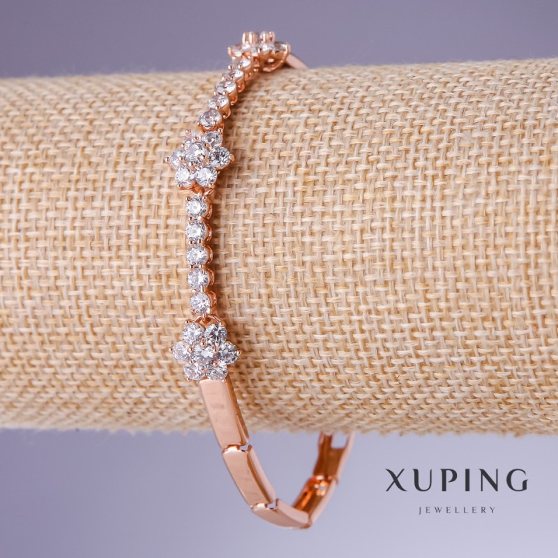 Bransoleta Xuping z białymi cyrkoniami, grubość 4–10 mm, długość 18,5–19,5 cm, pozłocenie 18K