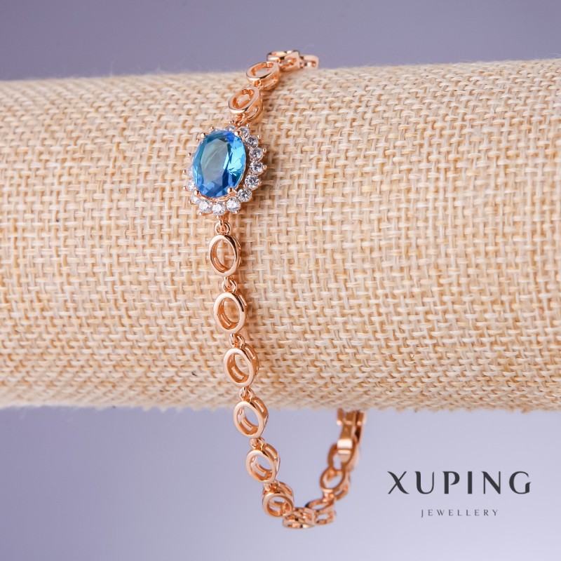 Bransoletka Xuping z błękitnymi cyrkoniami «Topaz», grubość 5–13 mm, długość 17–19 cm pozłacanie 18K