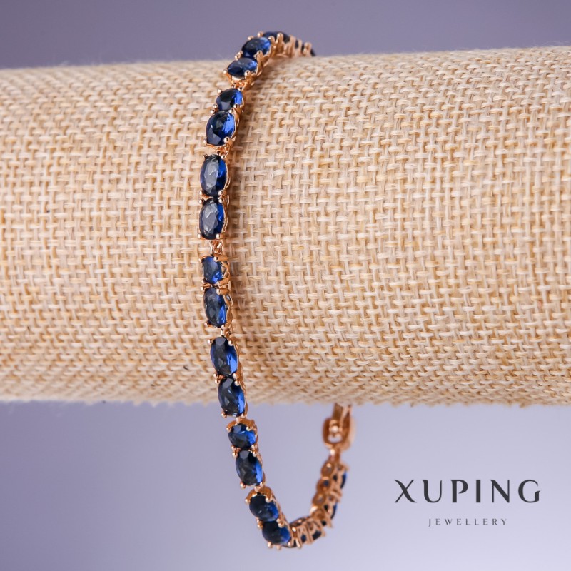 Bransoletka Xuping z niebieskimi cyrkoniami 'Szafir', grubość 5 mm, długość 18–21 cm, pozłacenie 18K