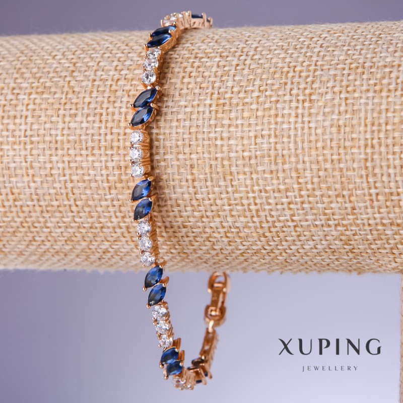 Bransoletka Xuping z niebieskimi cyrkoniami «Szafir», grubość 5 mm, długość 19–21 cm, pozłata 18K